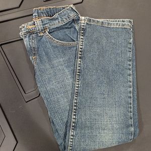 NWOT Wrangler slim jeans size 10, with adjustable waste